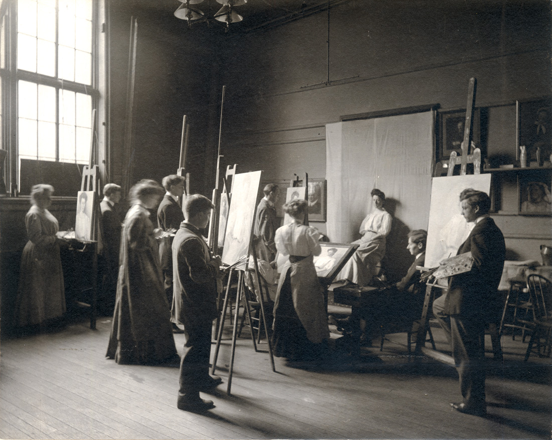 hsitory of the school, black and white image of the students in a studio