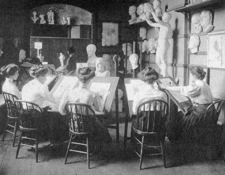 hsitory of the school, black and white image of the students in a studio