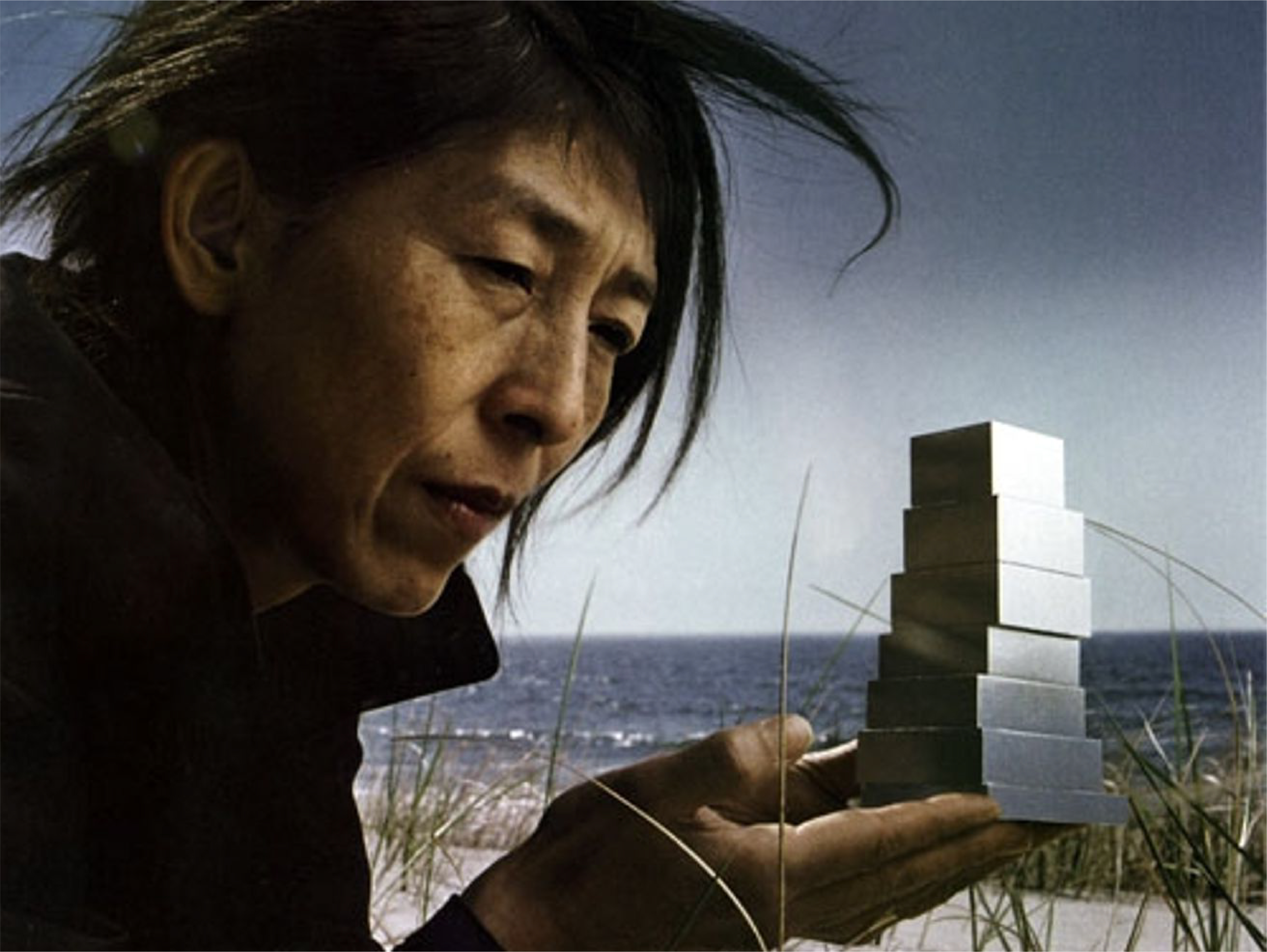 Kazuyo Sejima's holding her building model