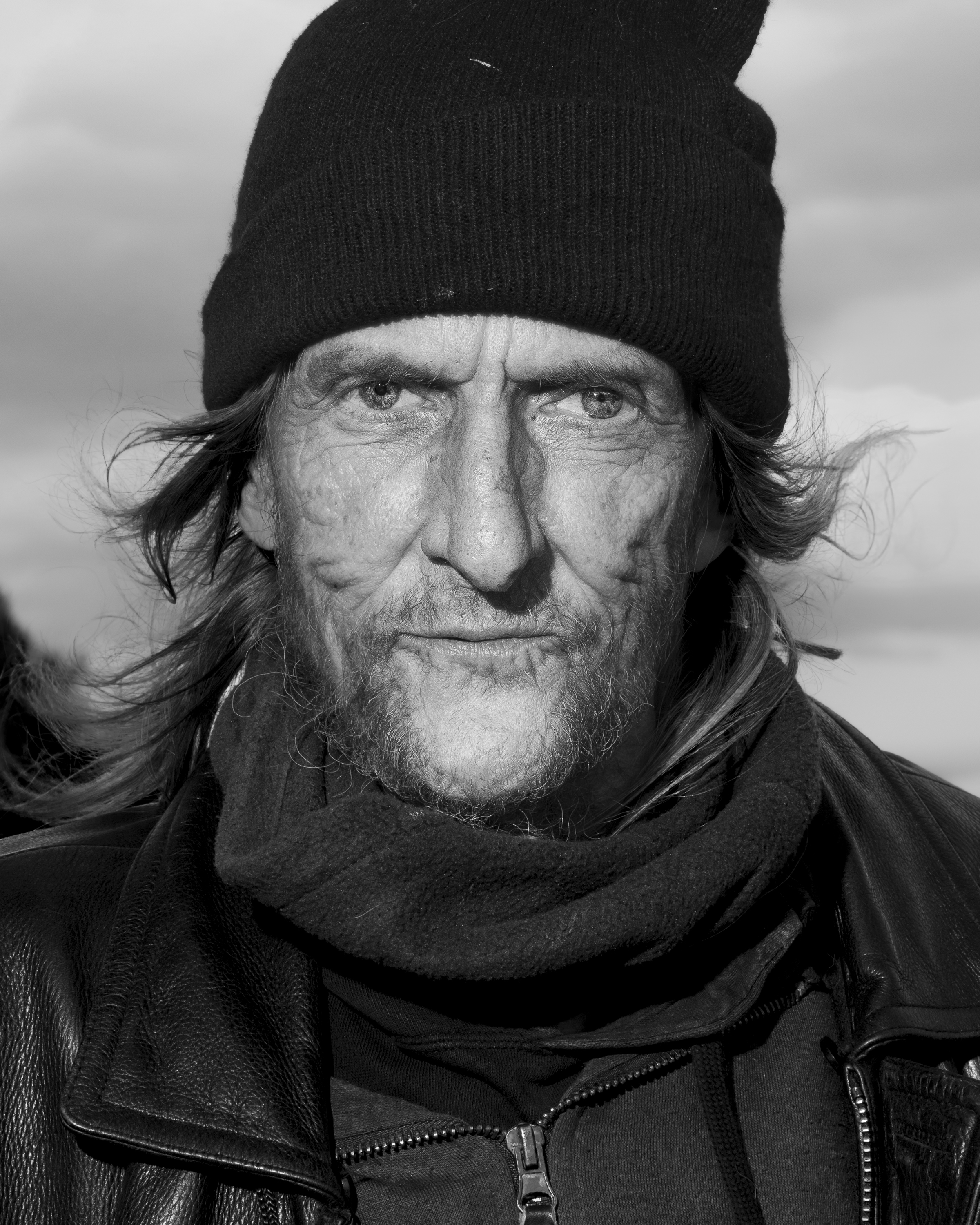 homeless man portrait striking facing camera