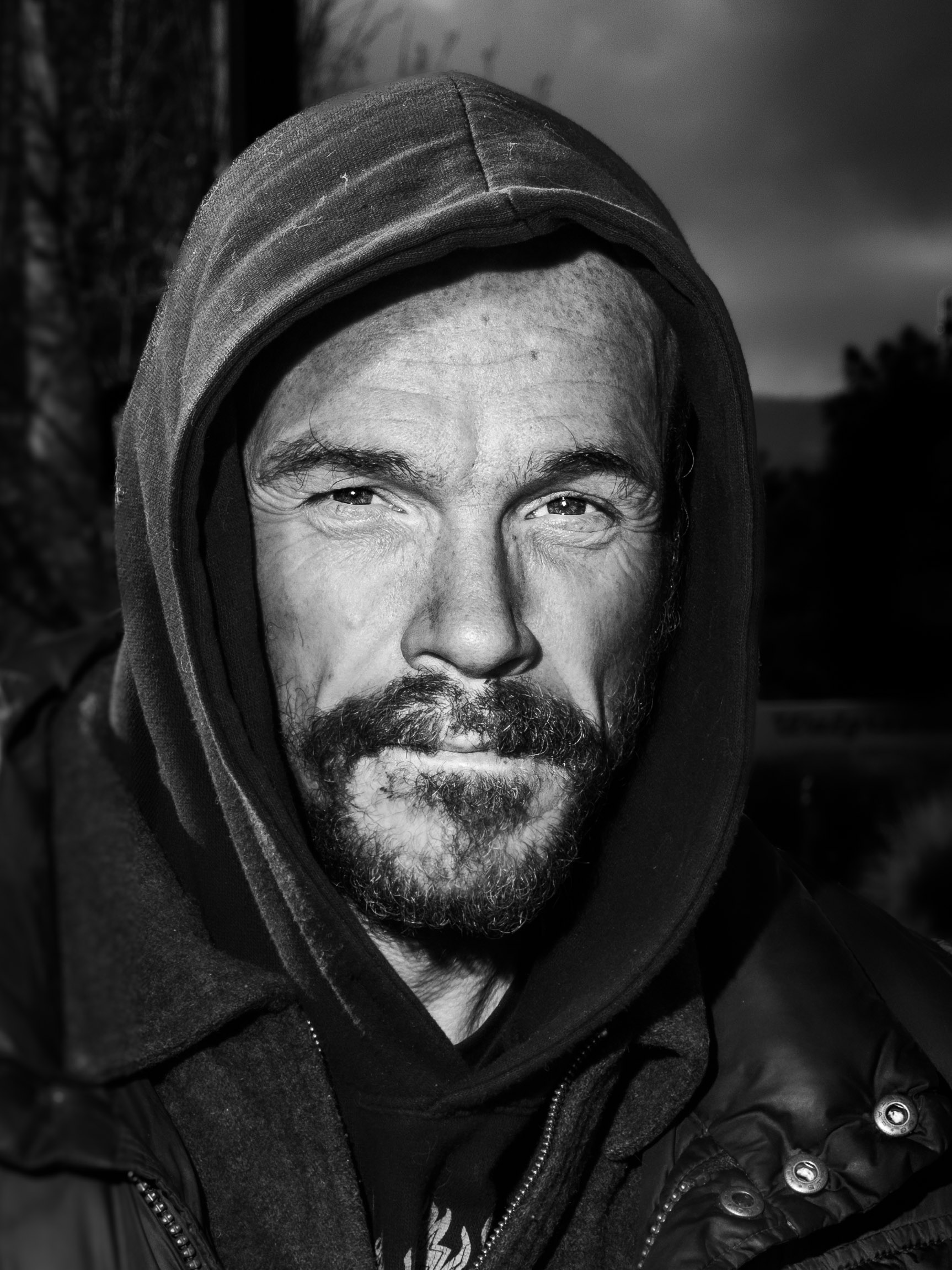 homeless man portrait bold facing camera