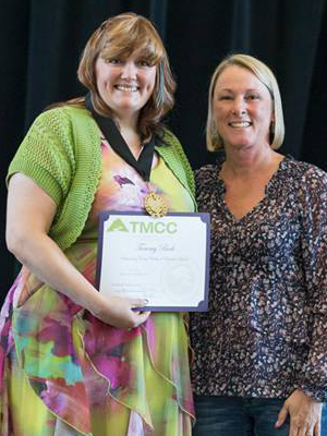 A student receiving her degree