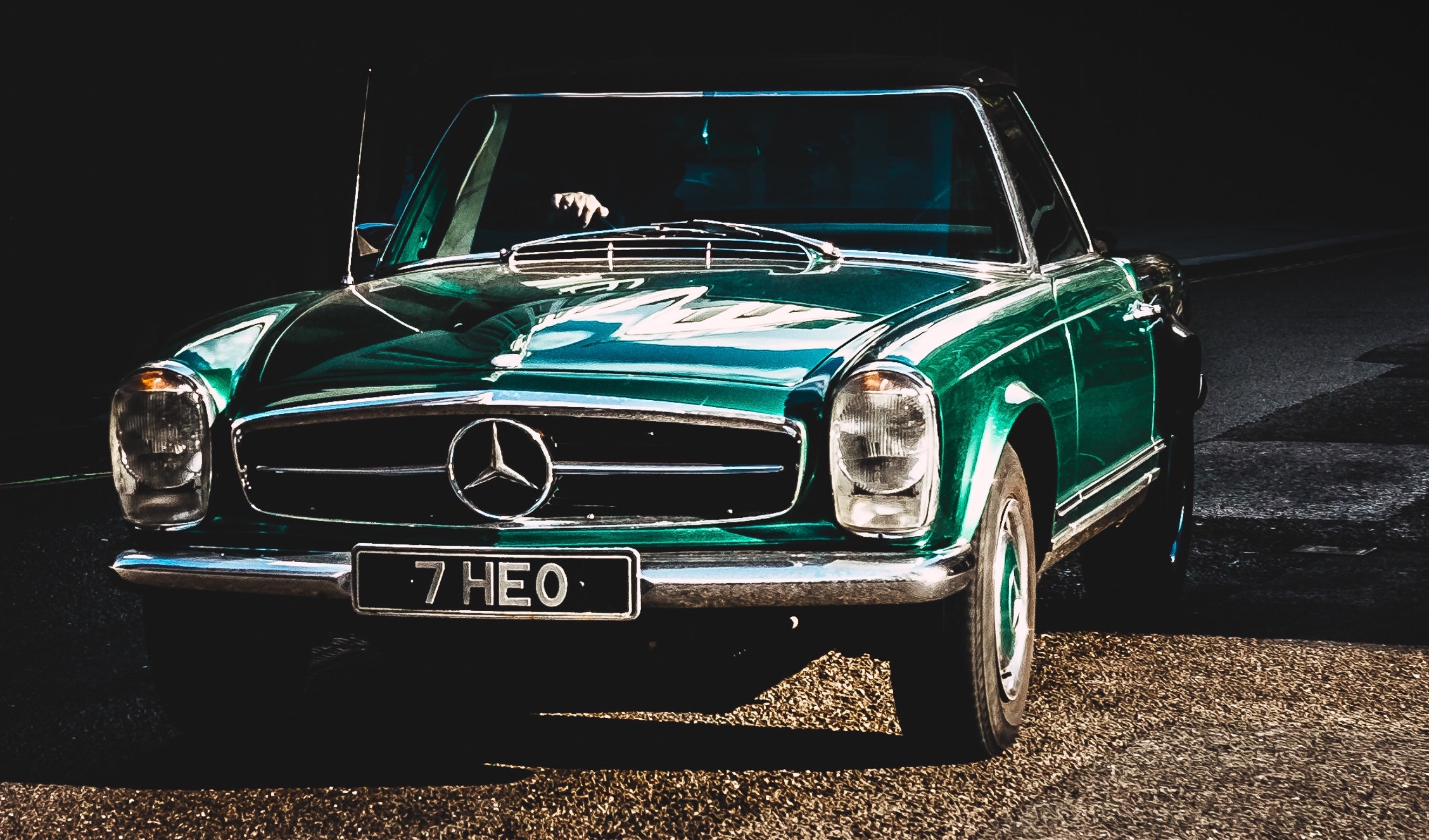 green classic mercedes vehicle