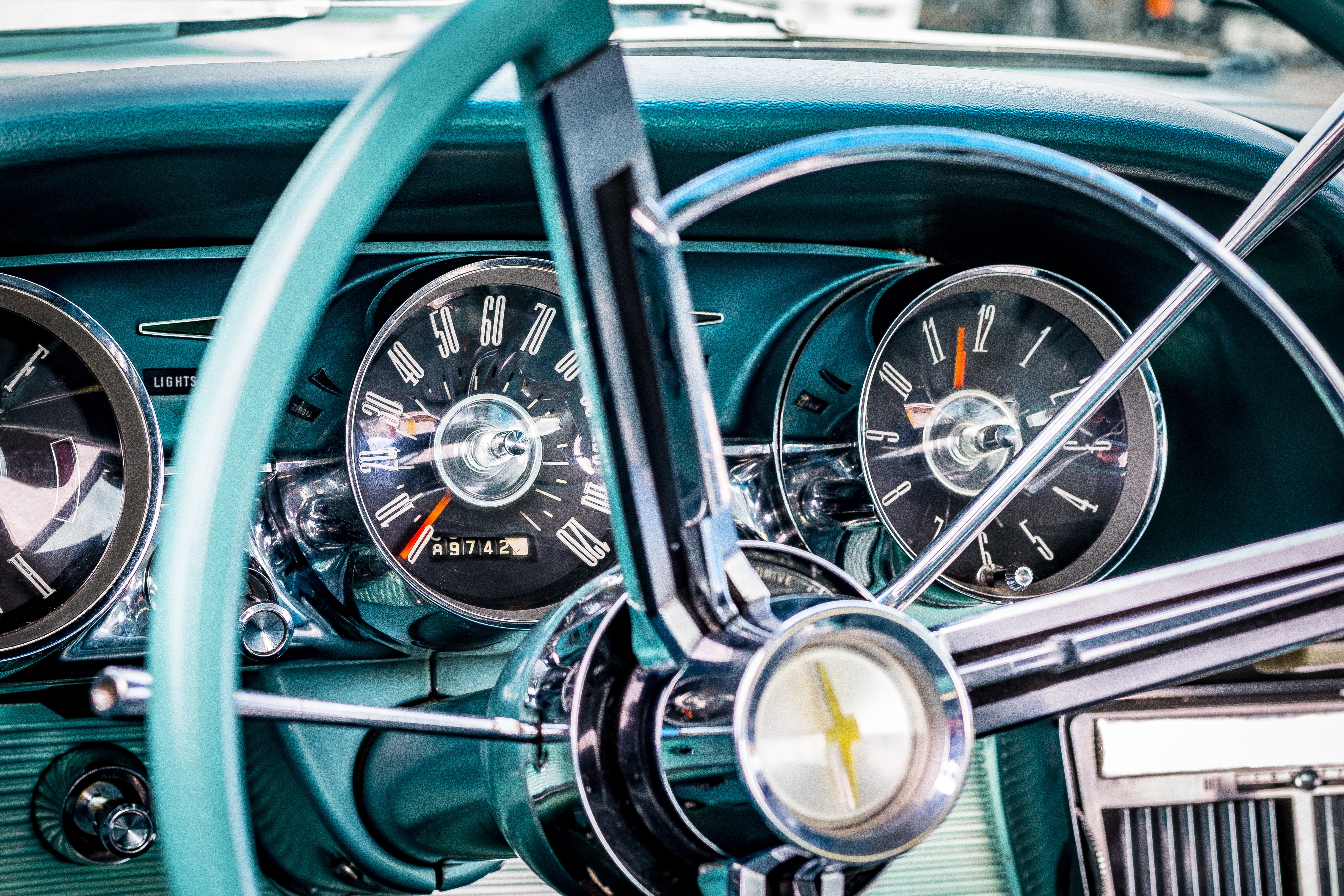 teal car interior and steering wheel