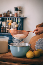 image of someone preparing cupcakes