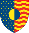 Yale Art School logo represented by a shield. Left side shield is navy blue with yellow stars and hald a yellow circle, the right side of shield has yellow and red wavey lines with a navy blue half circle.