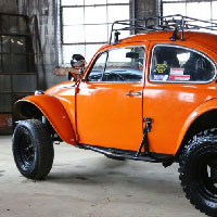 volkswagen burnt orange baja bug newly repainted and made pretty in the shop