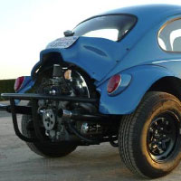 rear view of a royal blue baja bug at sunset ready for adventure.