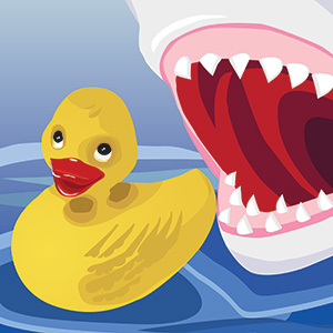 rubber ducky image generated by all GRC116 students leraning to us Adobe Illustrator for the first time.  A rubber ducky is swimming peacefully as a large shark, most likely named Bruce, lurks behind him JAWS wide open in anticipation of a scrumptious snack.