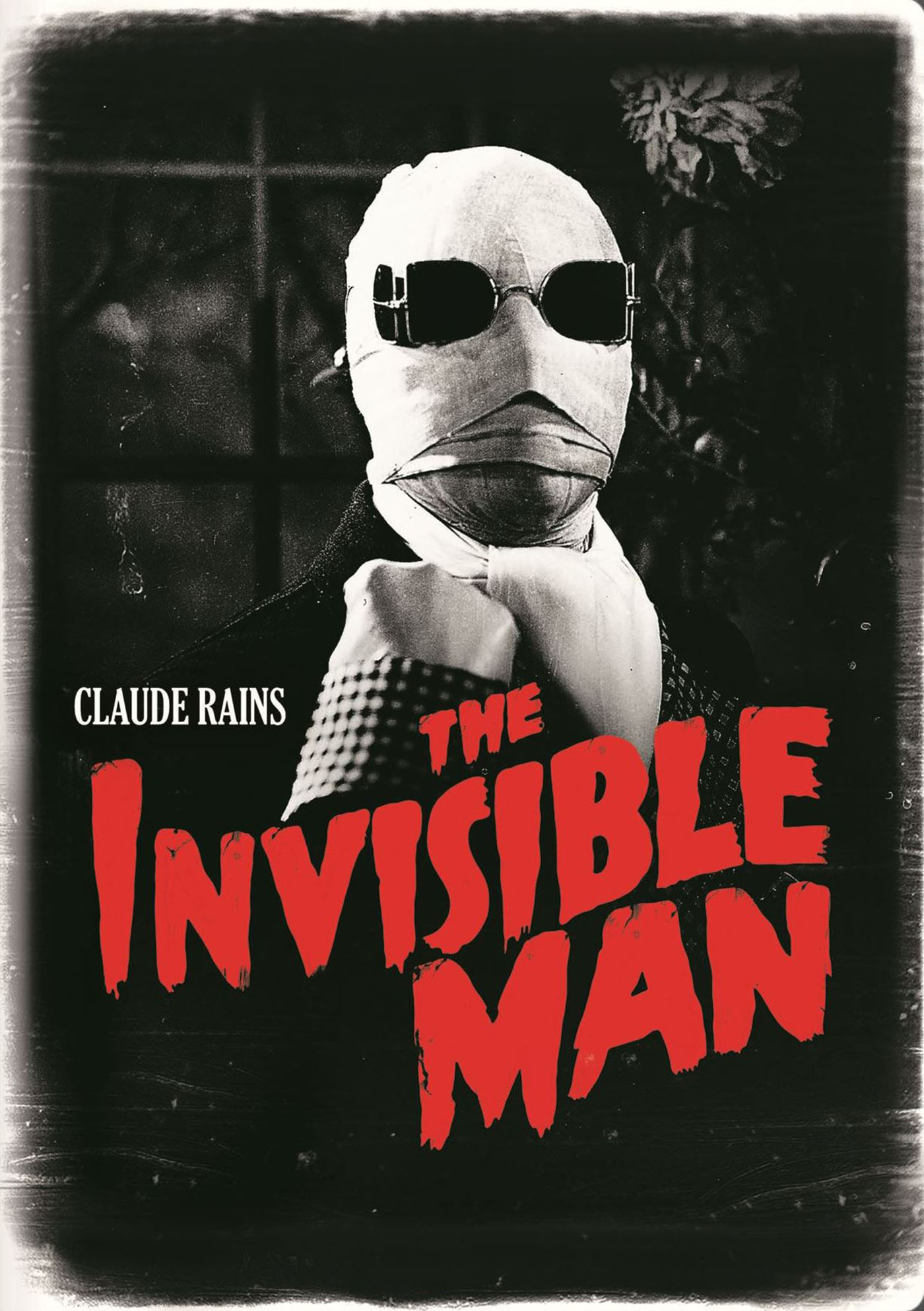  Classic black and white movie poster for invisible man with bold red text that says The Invisible Man