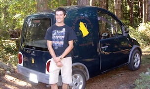 Chris standing next to Perky the delivery van