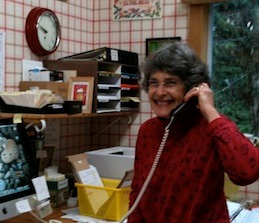 Owner Nan Beals talking on the phone
